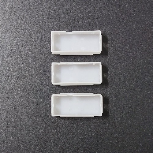 Copribatteria per canon e12 - copribatteria,